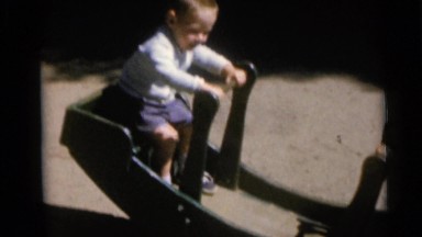 1967: two children have fun on a piece of playground equipment CAMDEN