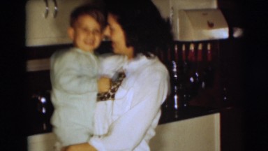 1967: a women playing with his children CAMDEN, NEW JERSEY