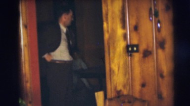 1954: mother and father playing around and being silly with child around