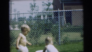 1954: two children playing in a gardens PENNINGTON, NEW JERSEY