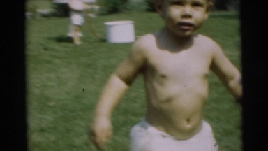 1967: adventurous baby has no shyness for the camera unlike his sibling