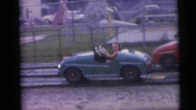 1954: Little Girl Rides Car At Amusement Park In Pennington, New Jersey
