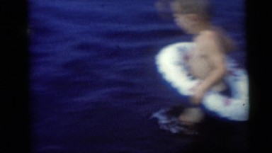 1954: kids in lake with floaties PENNINGTON, NEW JERSEY