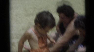 1967: A Family Enjoying a Sunny Day with Children in Camden, New Jersey