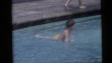 1954: Children Playing in Pool Water with Splashing and Swimming in Pennington, New Jersey