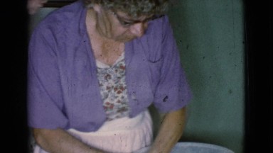 1968: the old women preparing something by using the pot COTTONWOOD, ARIZONA