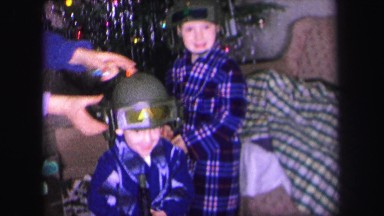 1972: children are dressed by their parents with cute gadgets LYNBROOK, NEW YORK