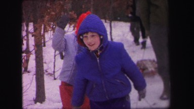 1972: two boys play in the snow together with a sled LYNBROOK, NEW YORK