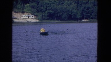 1964: Engaged Couple Playing in Watery Game on Lake Near Niagara Falls