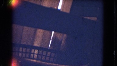 1964: house cat sits dominantly peering down off of it's perch NIAGRA FALLS