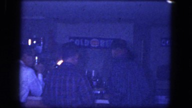 1964: men and women standing around a bar smoking and drinking NIAGRA FALLS