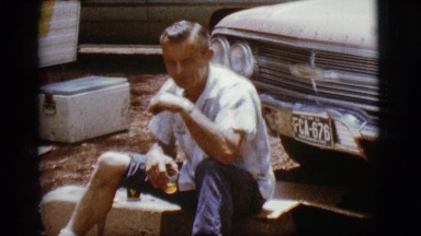 1968: a man drinking in the outdoors COTTONWOOD, ARIZONA