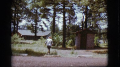 1968: a woman is seen walking in a forest area COTTONWOOD, ARIZONA