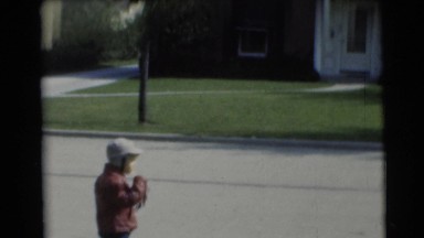 1953: little girl loves the camera, while the little boy does not WISCONSIN