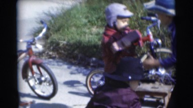 1953: childrens are playing when cycling WISCONSIN