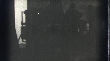1939: three men standing in room LOS ANGELES, CALIFORNIA