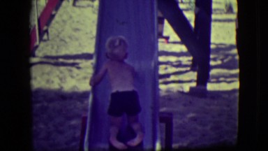 1946: kids playing on slides in a park LAS VEGAS, NEVADA