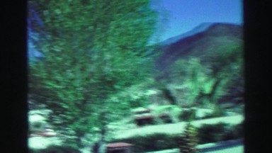 1969: journey through a village town at the bottom of a mountain range YOSEMITE,
