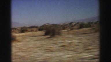 1969: journey through a vast barren land with mountains far away YOSEMITE,