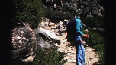 1969: one man stand on front of the hill YOSEMITE, CALIFORNIA