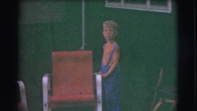 1951: child in coveralls playing near his home CANADA