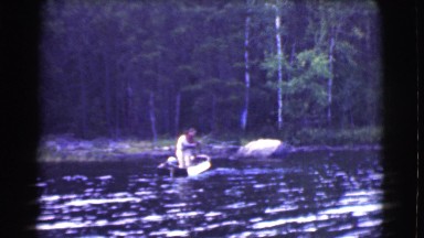 1951: people fishing in the river from boat CANADA