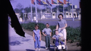 1964: Mother and Small Child Play Barefoot in Camden, New Jersey