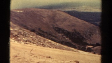 1967: mountain area is seen traveling by road COLORADO