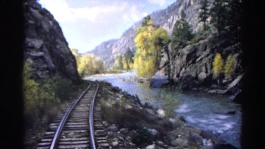1967: vehicle going past nice scenery somewhere remote and quite