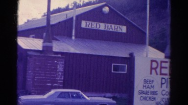 1967: crowd beside red barn COLORADO