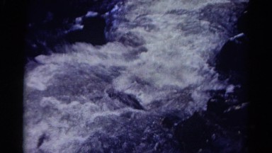 1967: an amazing flow of river between two large rocks as great walls COLORADO