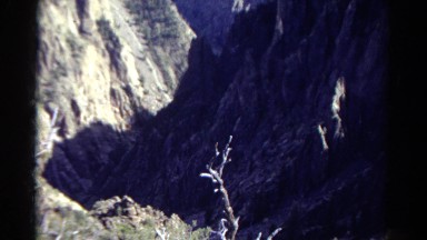 1967: look at deep canyon with dense greenery on sunny and bright day. COLORADO