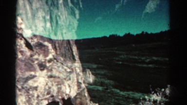 1967: duplicate film of driving down the road and canyon COLORADO