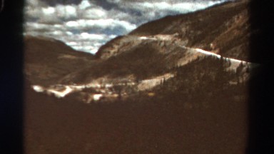 1967: mountain area is seen traveling by road COLORADO