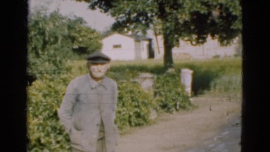 1948: old man standing in driveway waiting for action DENMARK