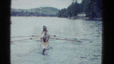 1951: four young men starting rowboat exercise in lake DANVILLE, ILLINOIS