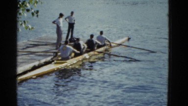 1951: group of men getting out of row boat DANVILLE, ILLINOIS