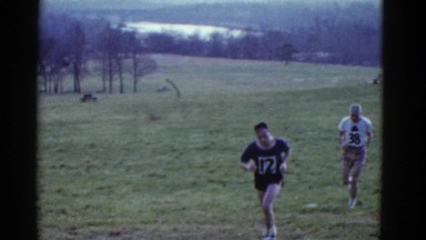 1951: Cross Country Runners Trek Through Field During Race Danville, Illinois