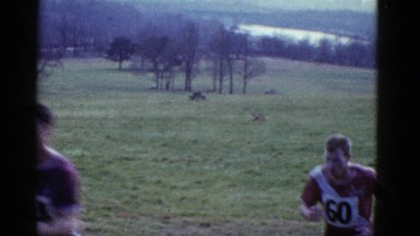 1951: men running race up hill through an open field DANVILLE, ILLINOIS