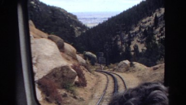 1967: view from the engine car of train traveling through western canyon