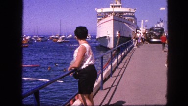 1963: busy port with many small and large vessels anchored CALIFORNIA