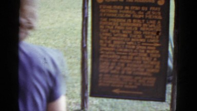 1952: person reads information about the city of san jose. NEVADA