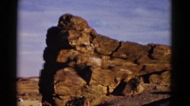 1952: hilly area is seen with car NEVADA