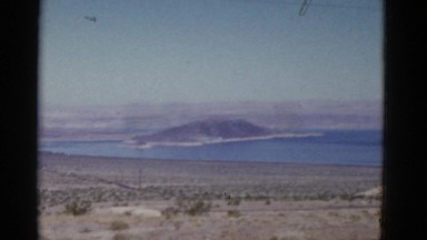 1952: beautiful lake nestled in rugged mountainous landscape CALIFORNIA