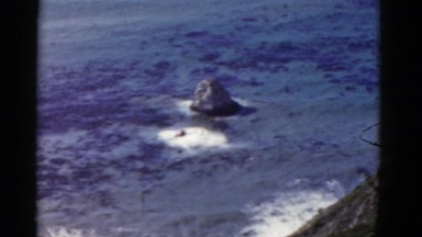 1952: beautiful blue ocean as seen from above rugged mountain CALIFORNIA