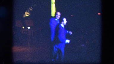 1963: stage performance comedian twist dancing getting laughs. CALIFORNIA