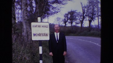 1969: a man in suit is seen walking ENGLAND