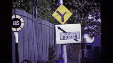 1969: people walking along a street with cars driving to and from dublin