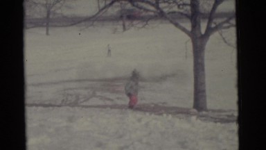 1963: a snow covered road is seen CAMDEN, NEW JERSEY