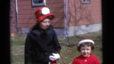 1963: two women, two boys and a girl dressing in their best clothes